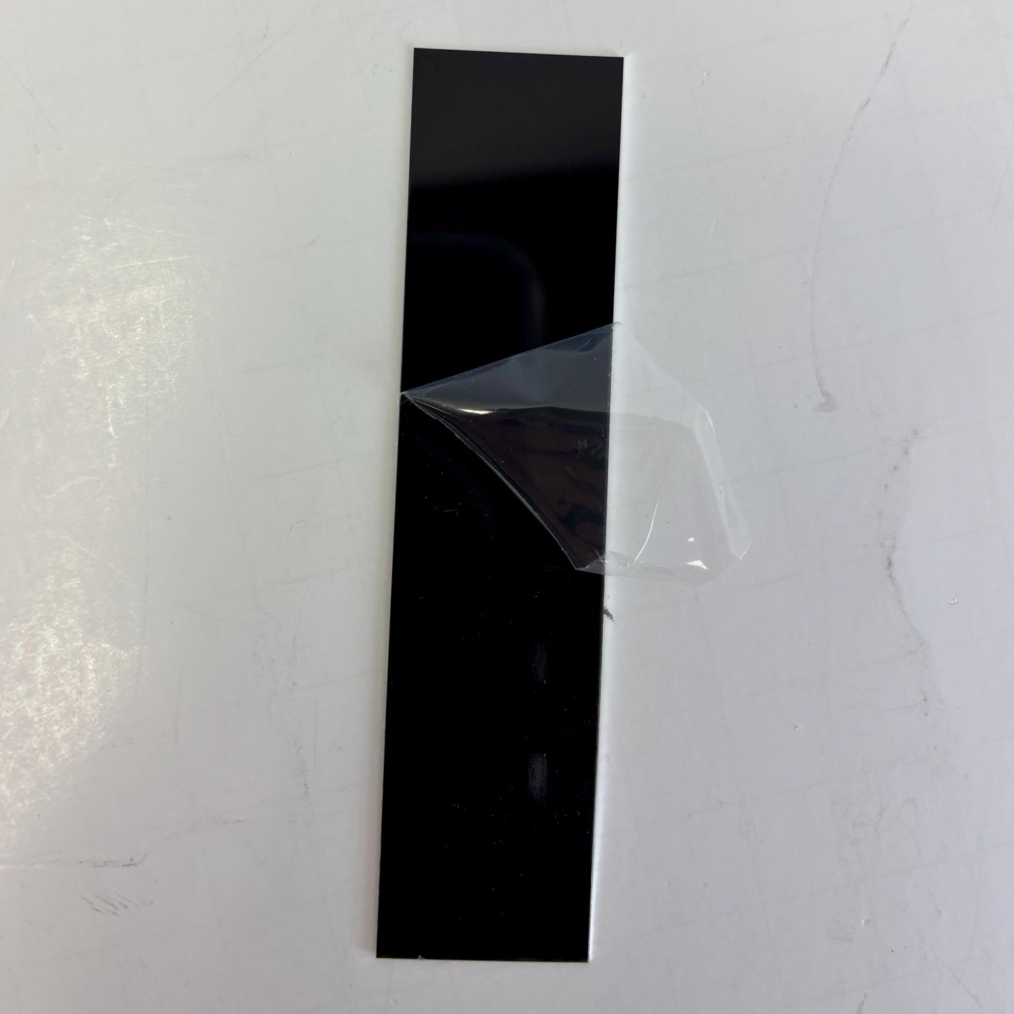 blank cut aluminum metal with protective plasting