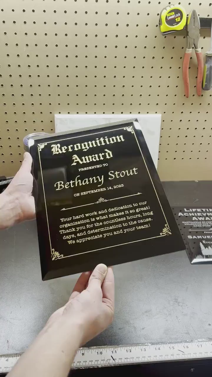 black glass with gold recognition award plaque