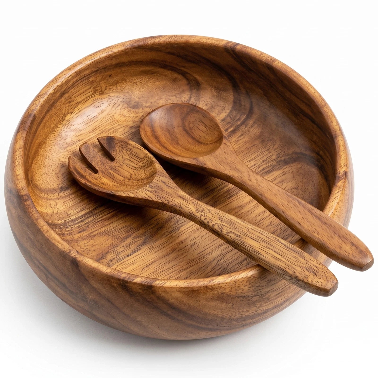 Wooden salad bowl with two wooden spoons
