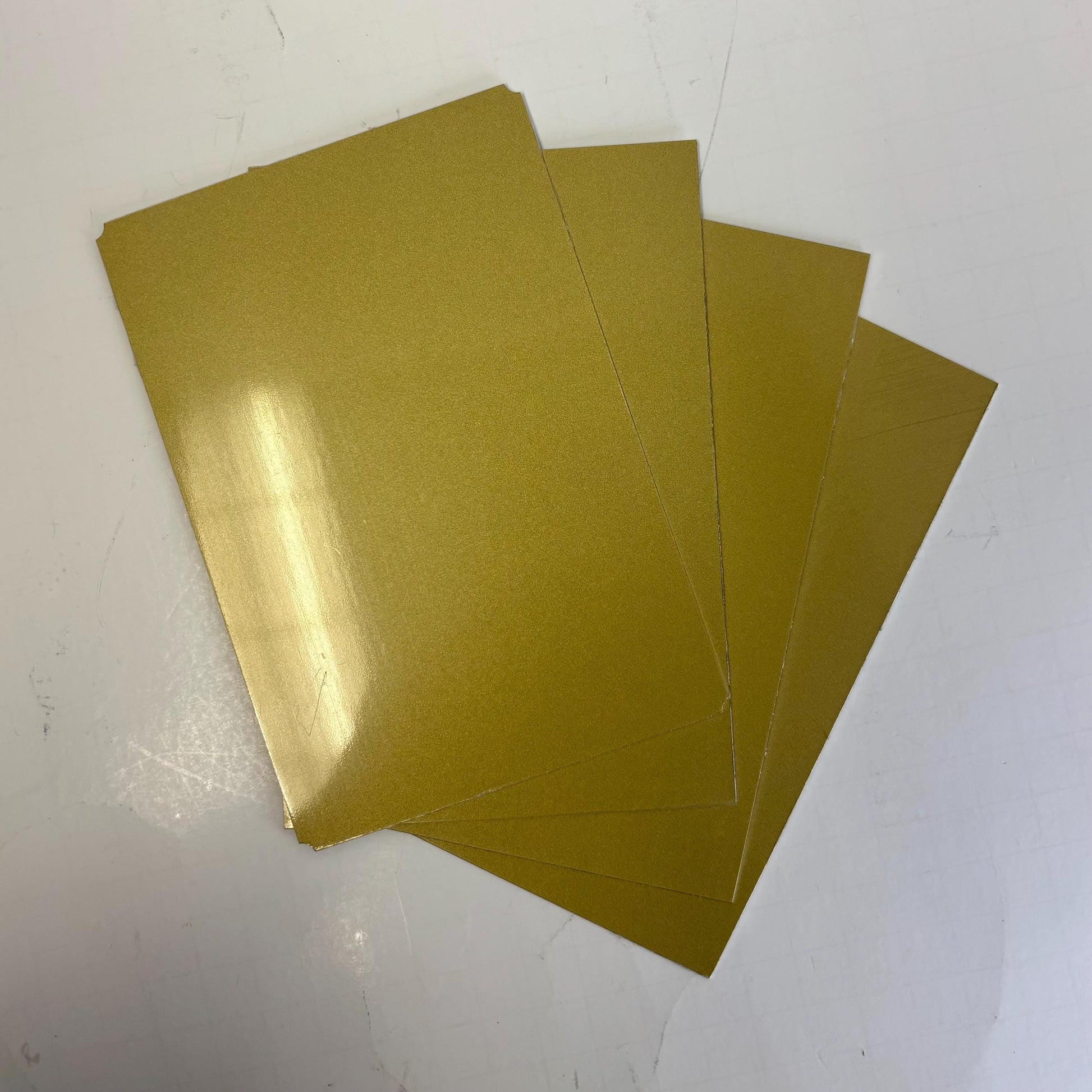 gold metal cut outs multiple sizes gold engraves black