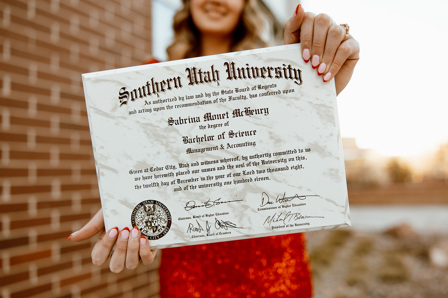 Marble Finish Diploma Plaque, held by model