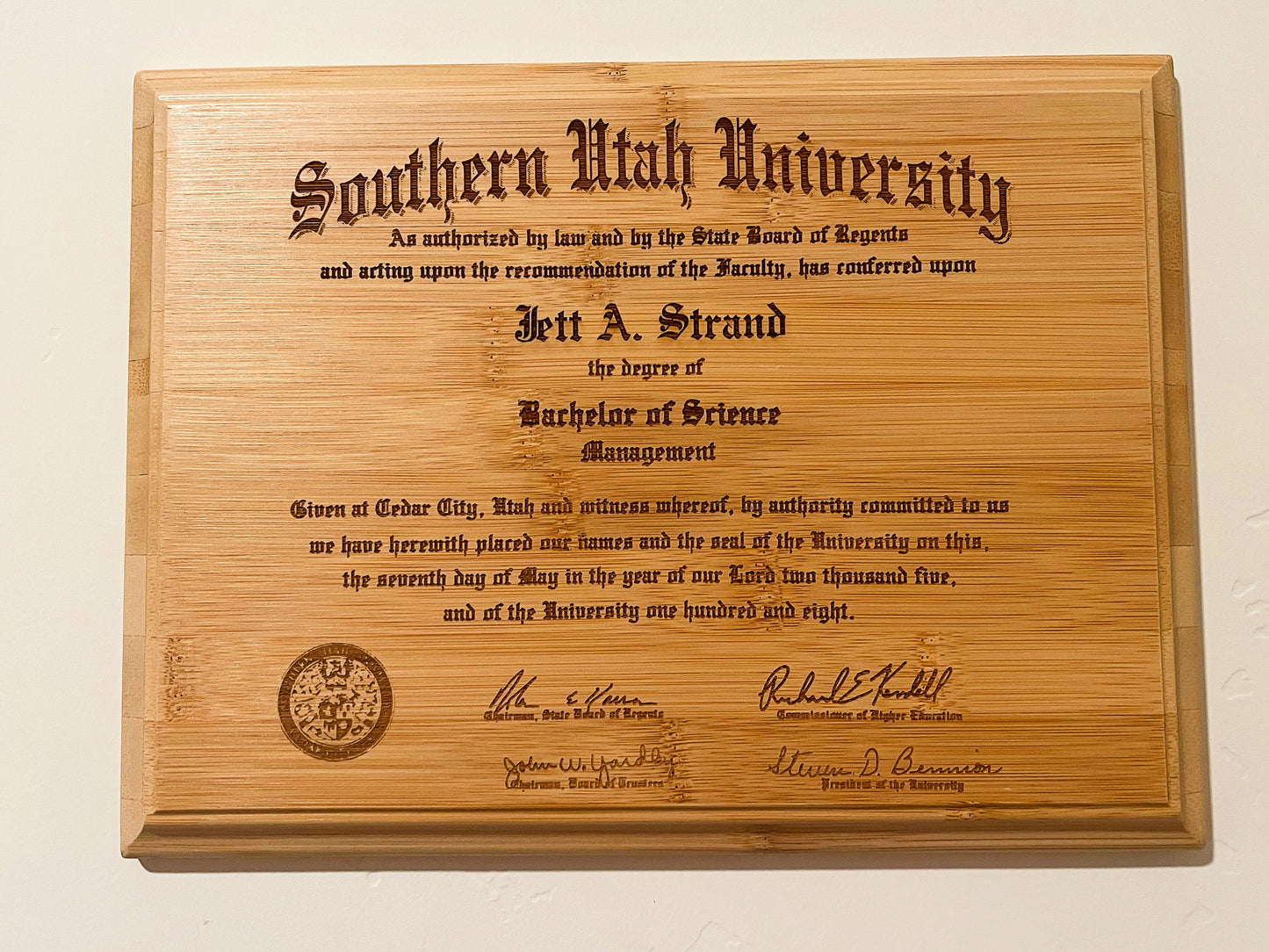Authentic Bamboo Diploma Plaque, on a wall